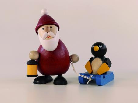Paul Ullrich Weihnachtsmann mit Schlitten und Pinguin 
