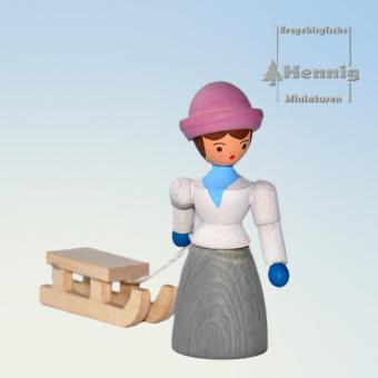 Hennig Miniaturen Frau mit Schlitten mittel 