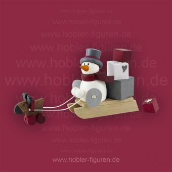 Hobler Schneemann Otto mit Geschenkeschlitten 